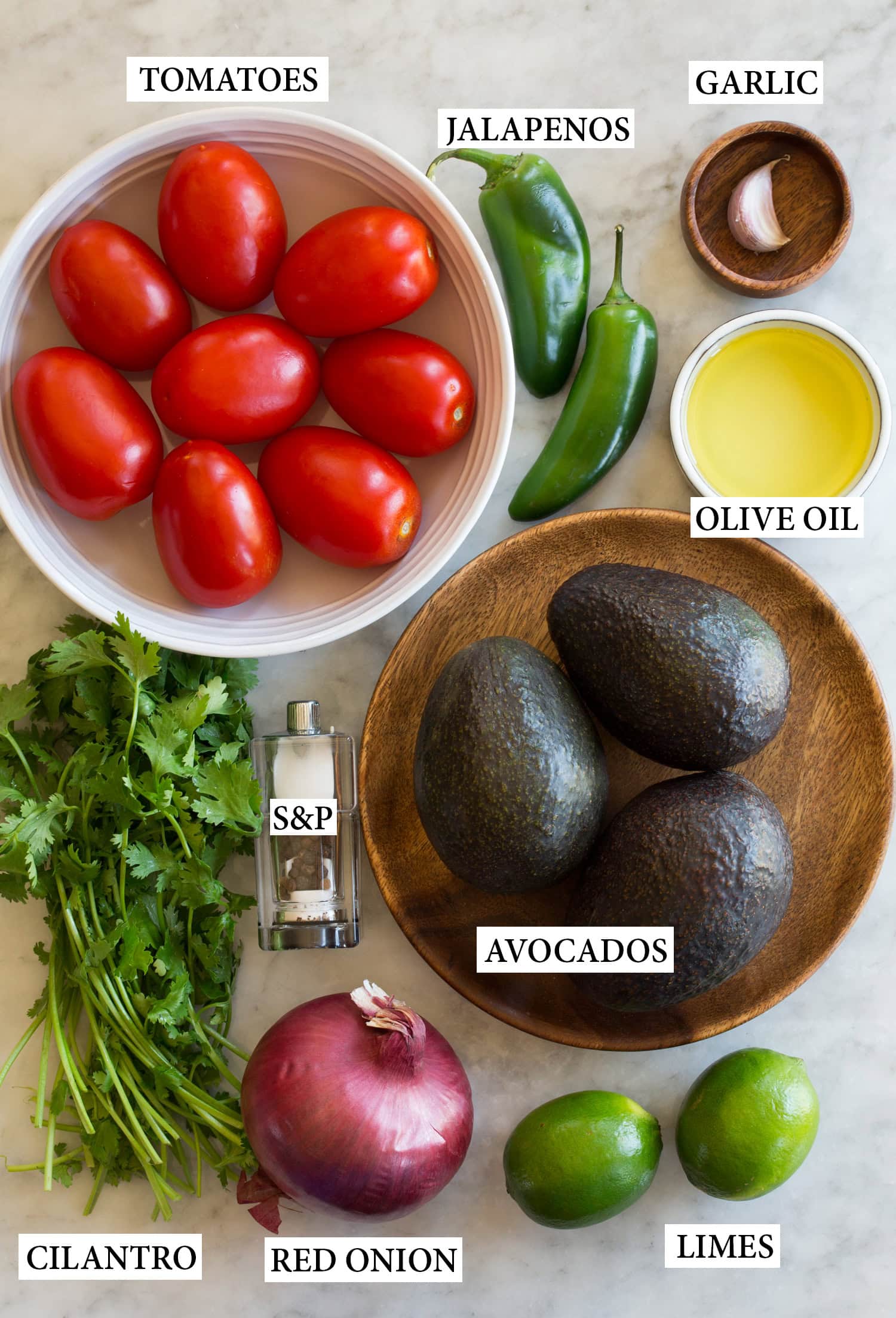 Ingredients needed to make avocado salsa.