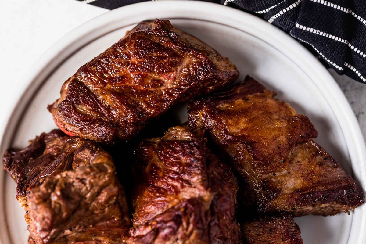 Browned chuck roast beef chunks to make barbacoa beef.