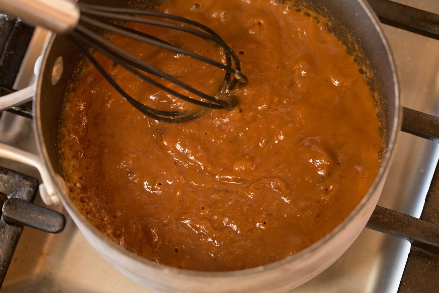 Coq au vin sauce added to roux to thicken.