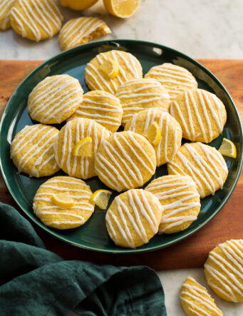 Plate of lemon cookies with icing.