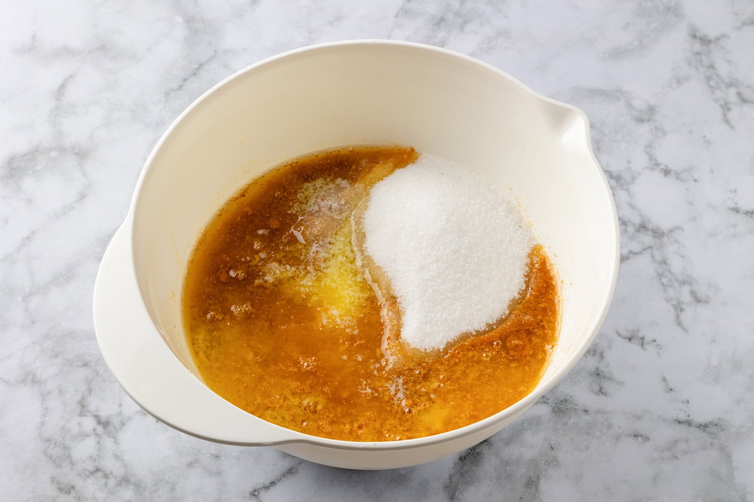 Graham cracker crust mixture shown before mixing in a mixing bowl.