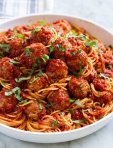 Bowl full of spaghetti and meatballs.