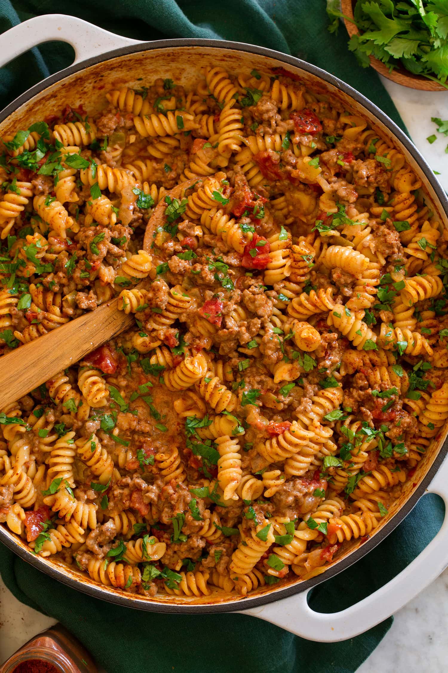 Taco pasta shown close from overhead in a large skillet.