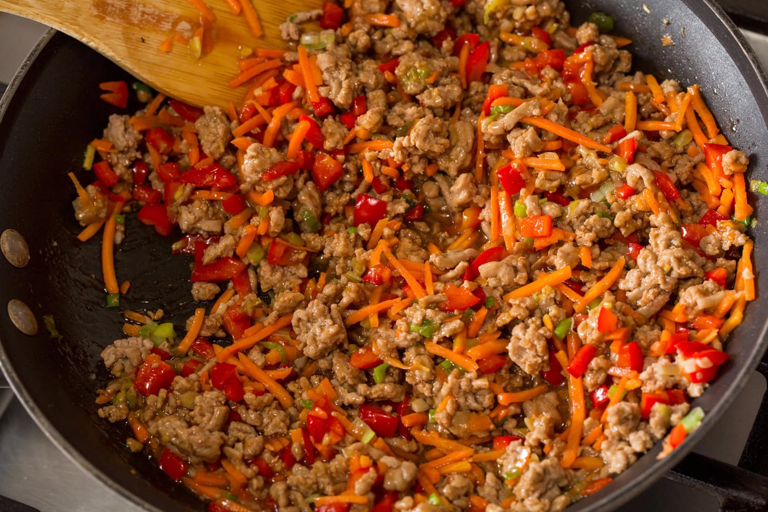 Completed lettuce wrap filling shown in the skillet.