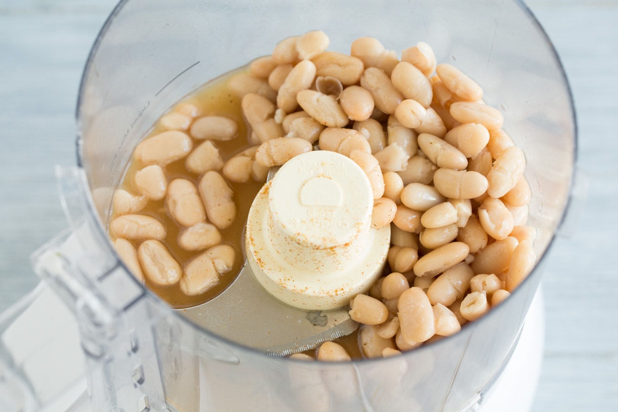 Pureeing cannellini beans in food processor for white chicken chili.